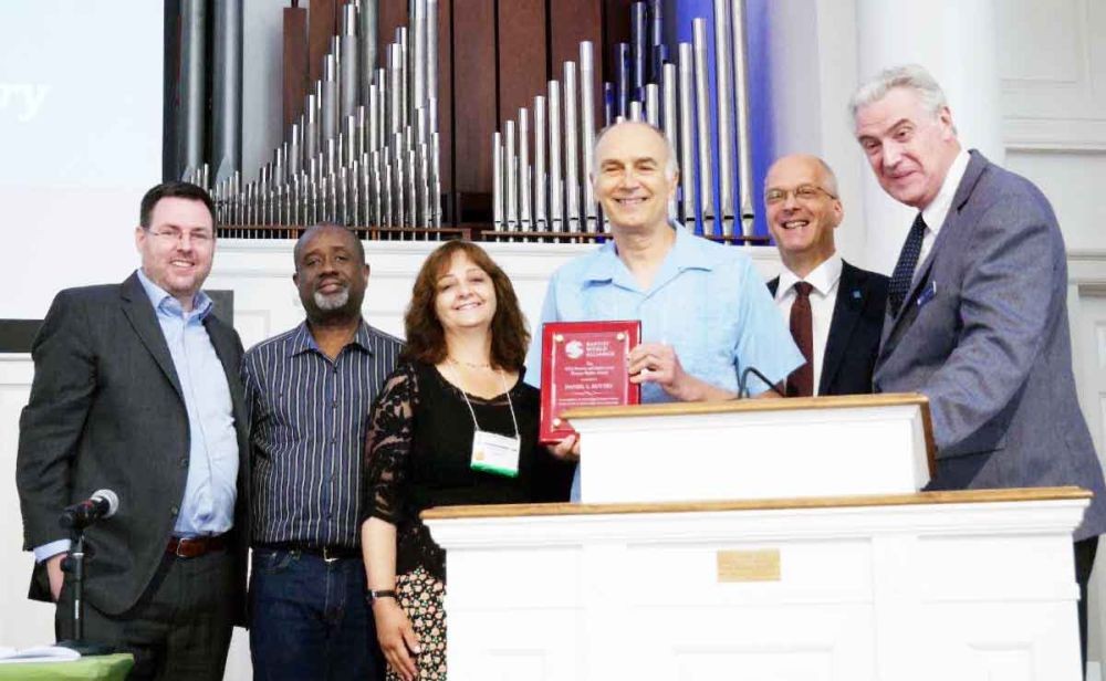 Daniel L Buttry received the 2022 Denton and Janice Lotz Human Rights Award conferred by the Baptist World Alliance during its annual gathering.